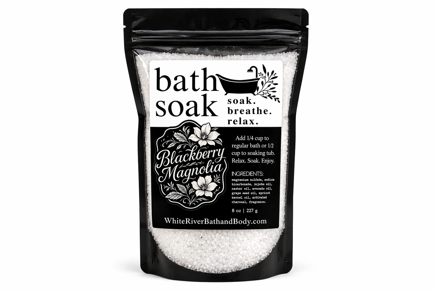 Black and white packaging of bath soak with branding and product details.