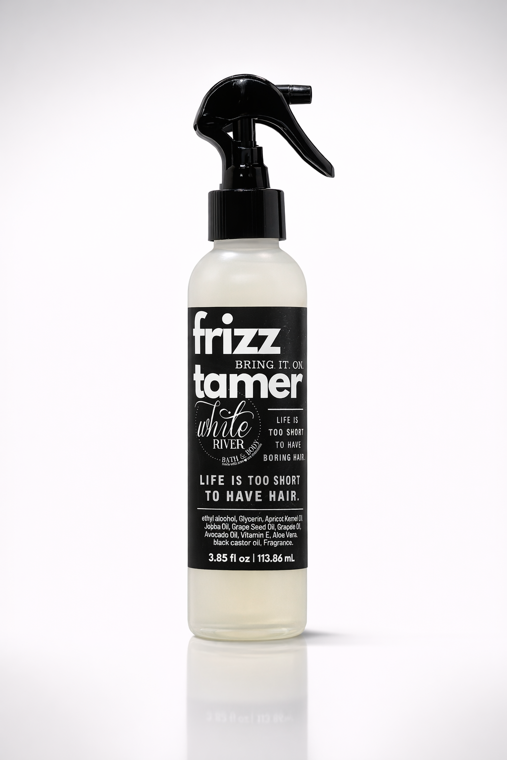 Bottle of frizz tamer with black and white label on a white background