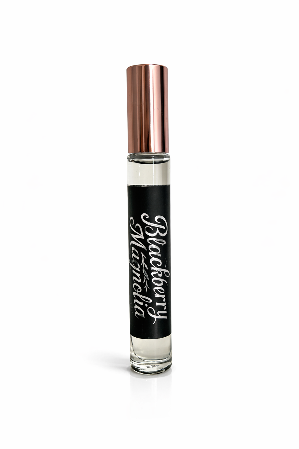 Perfume bottle with black label and rose gold cap on white background