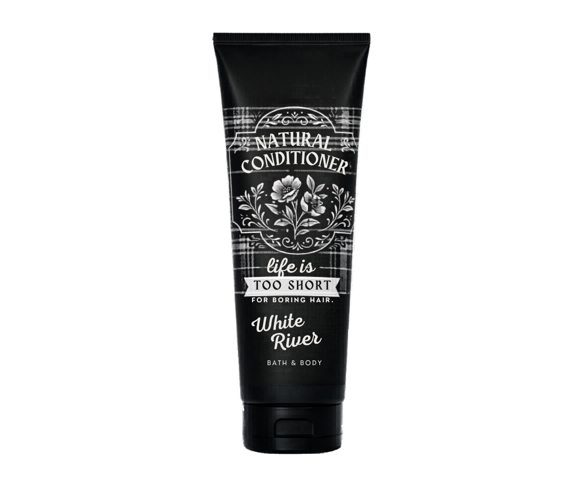 Black tube of 'Natural Conditioner' with floral design and text on a white background