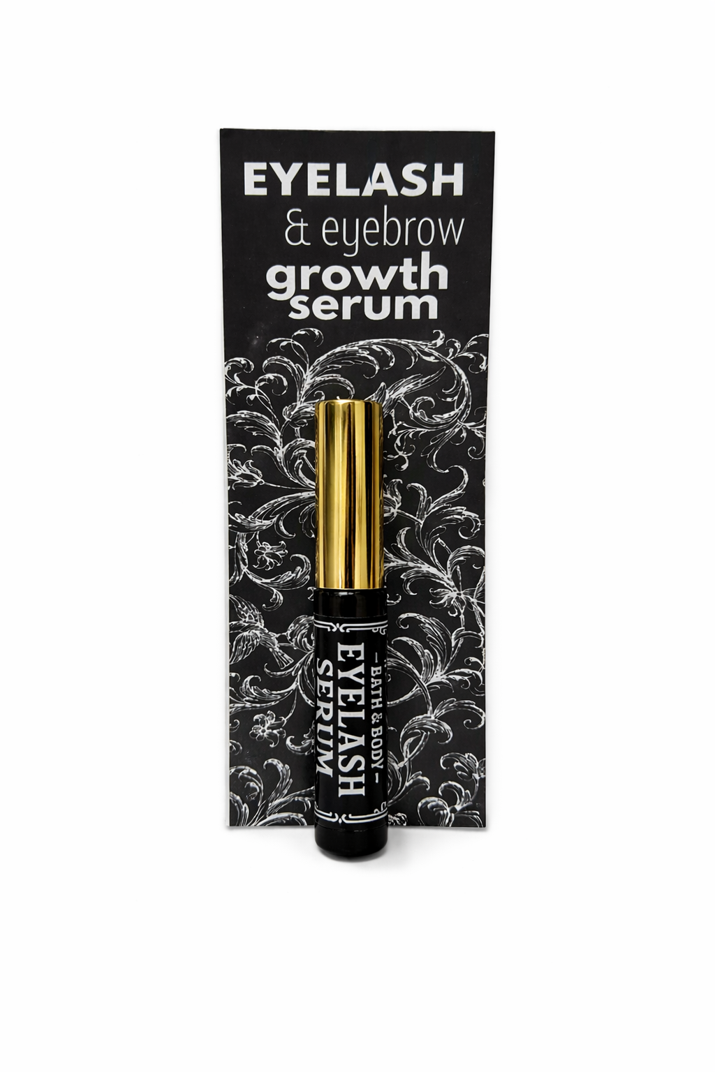 Eyelash and eyebrow growth serum packaging with black and gold design on a white background