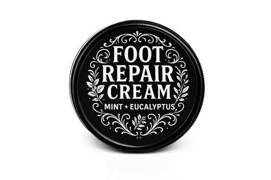 Foot repair cream container with decorative text on a white background