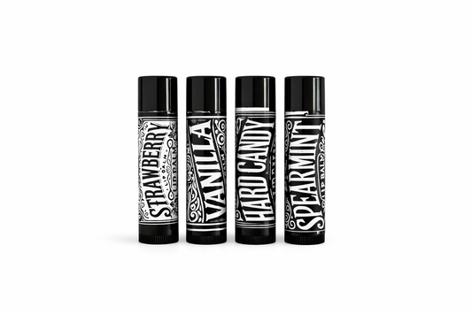 Four lip balm tubes with different flavors on a white background