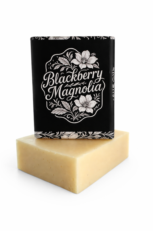 Bar of soap with a 'Blackberry Magnolia' packaging on a white background